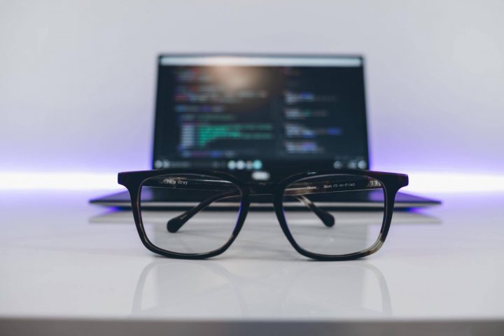 Microcopy writing: a computer and glasses